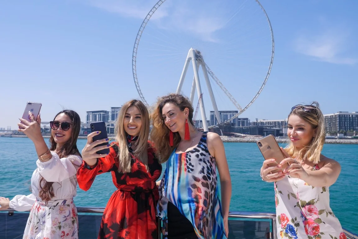 Visitors enjoying yacht experiences in Dubai Marina
